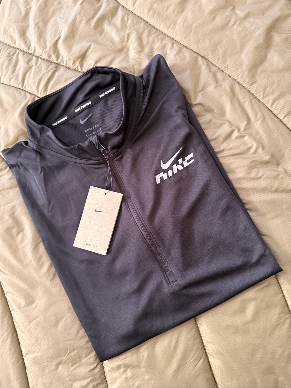 Nike Running Men’s Black Quarter-Zip Dri-FIT Pullover with reflective accents